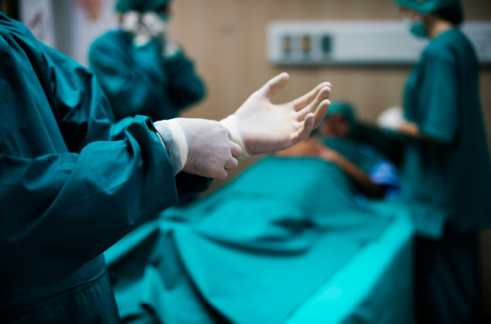 Delicate surgery saves woman from ruptured brain artery - Archive