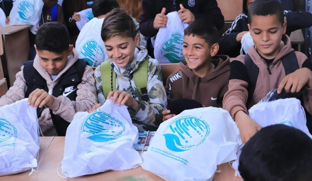 توزيع ملابس شتوية على أطفال غزة