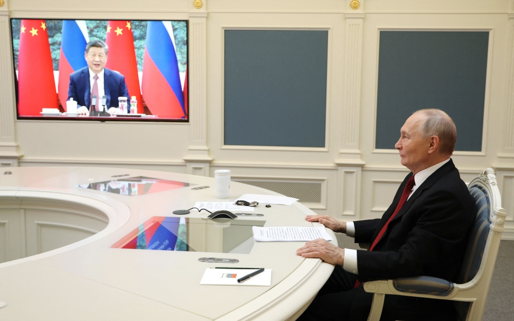 Putin and Xi Jinping during video talks